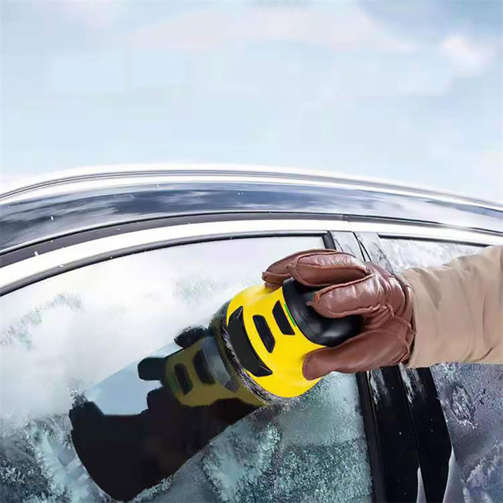 Electric ice scraper on frosty windscreen