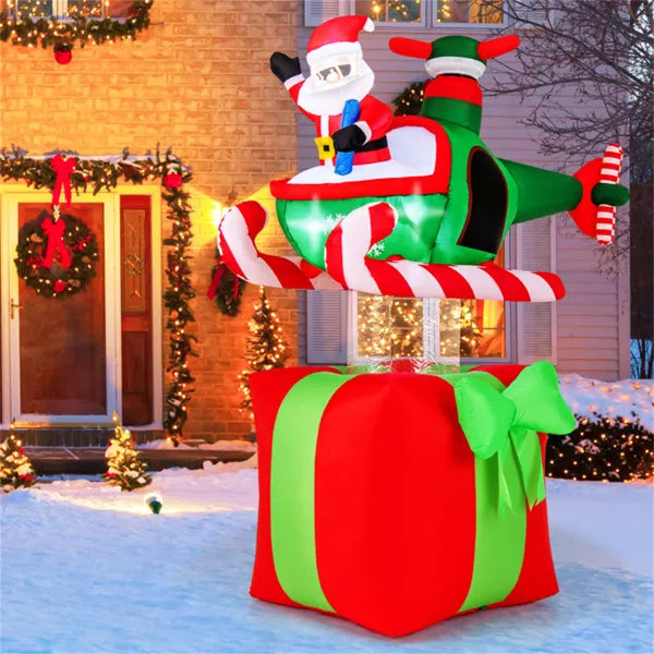 Inflatable Santa in a helicopter on a gift