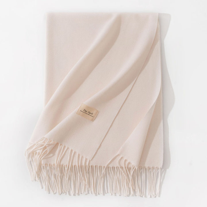 Woman wearing wide soft shawl scarf