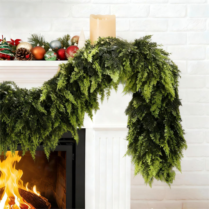 Green Norfolk pine garland on a mantelpiece