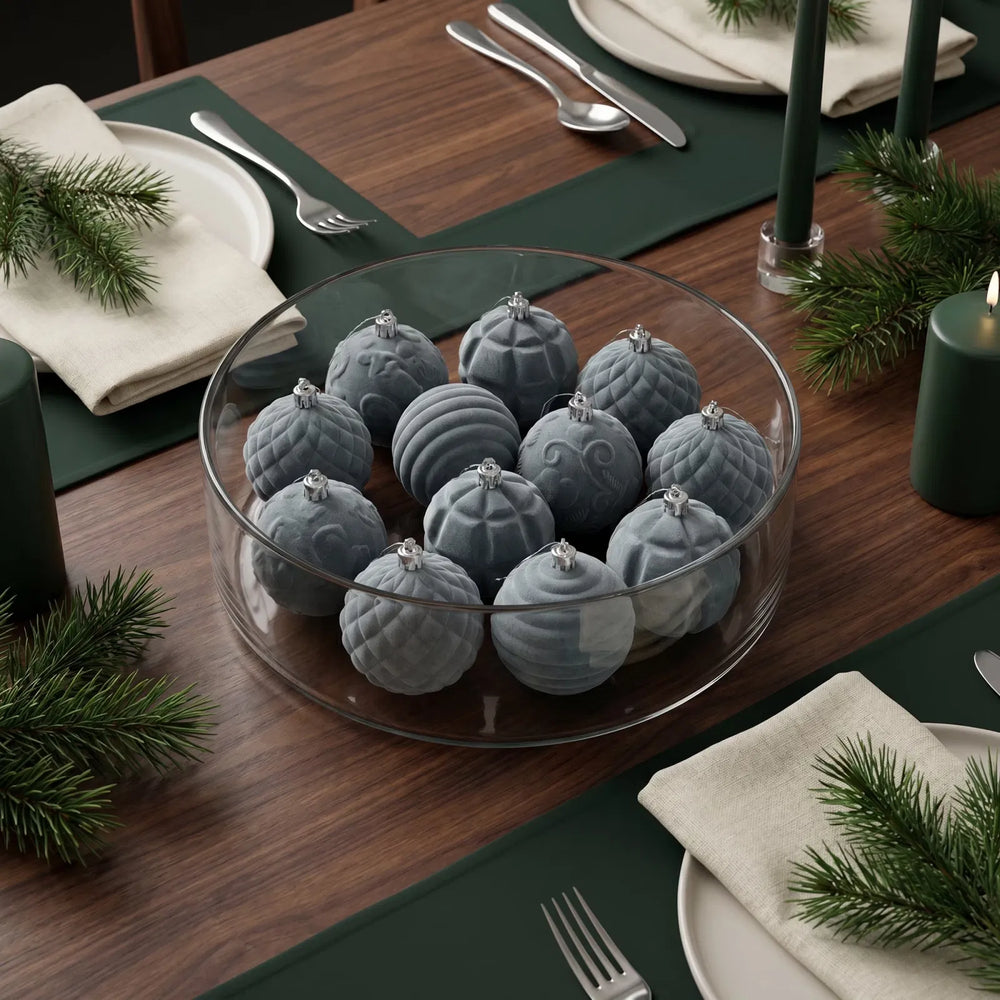 Twelve grey velvet Christmas baubles with patterns