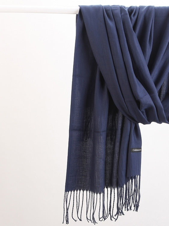 Woman in soft fringed scarf