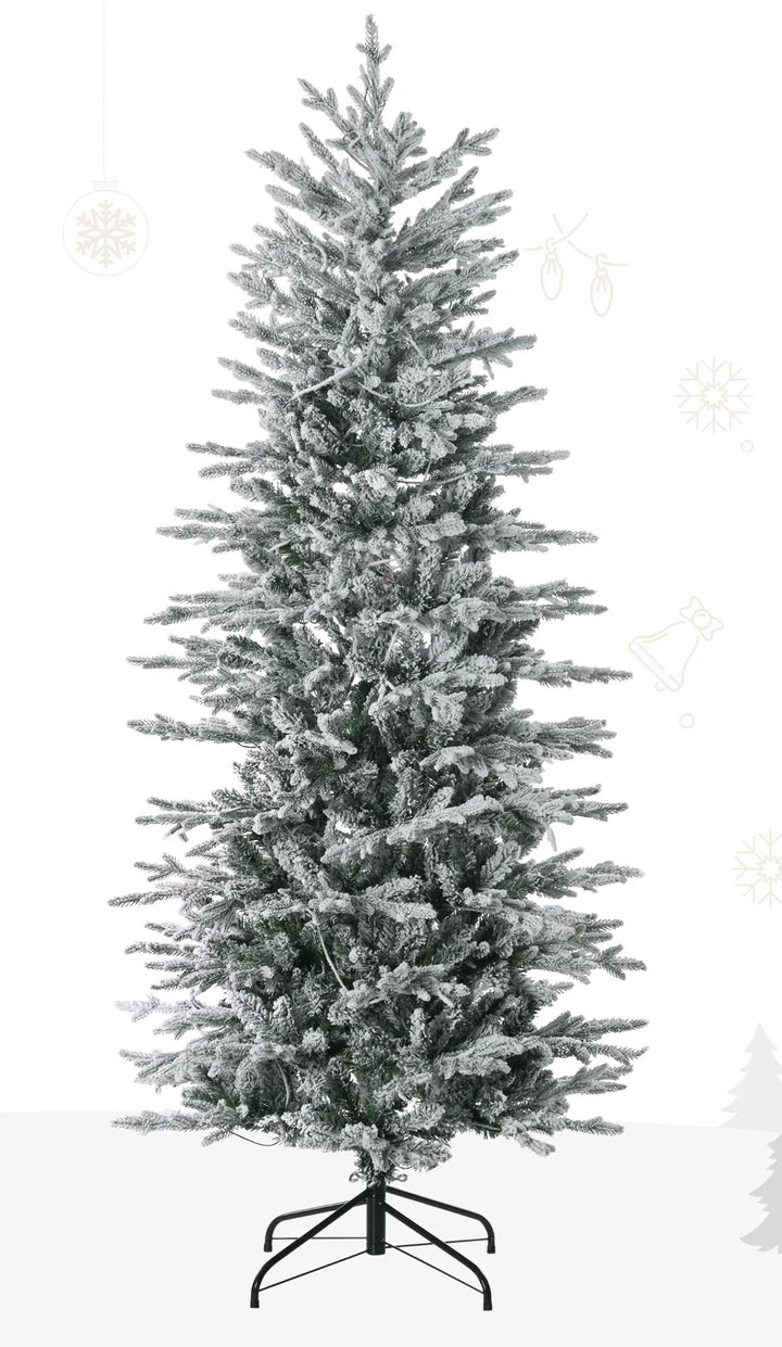 Snow-flocked tree with clear warm lights