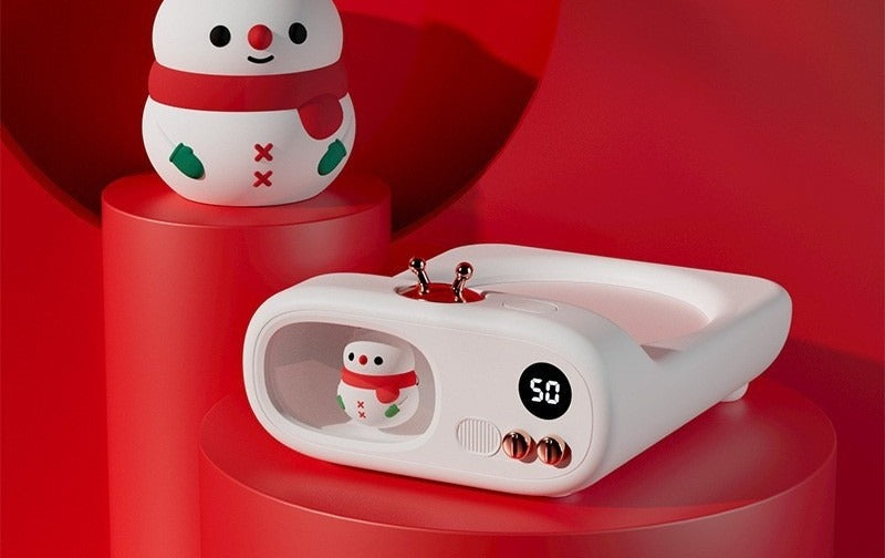 TV shaped mug warmer with unicorn figure
