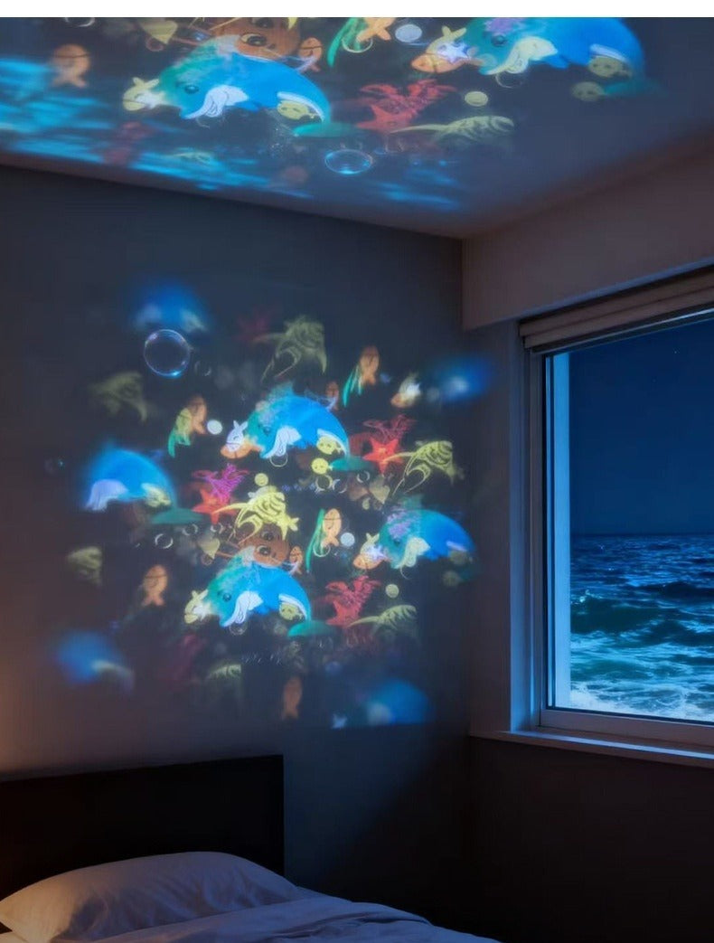Rotating projector night light casting snowflakes