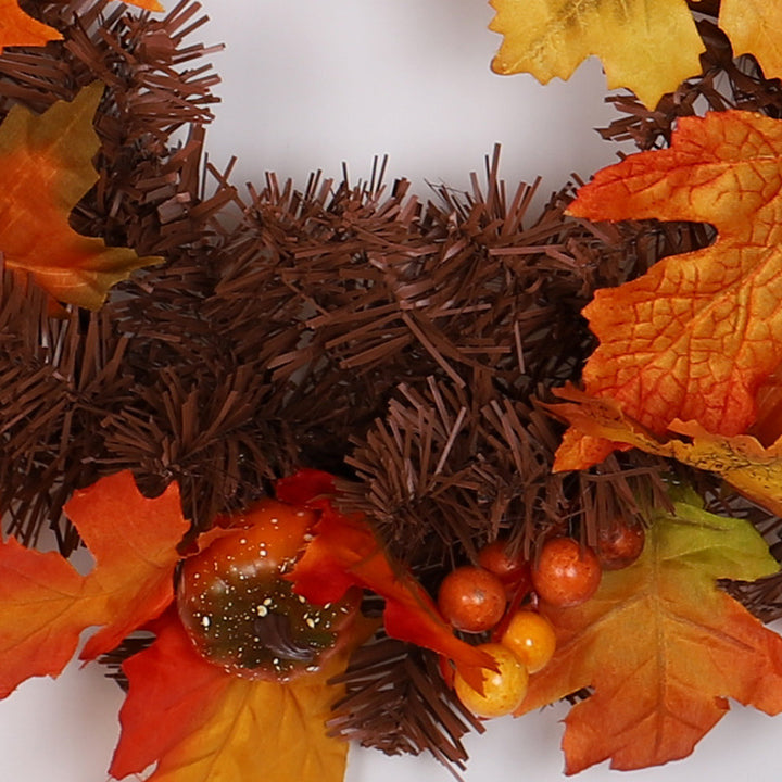 Autumn maple leaf garland on a mantel