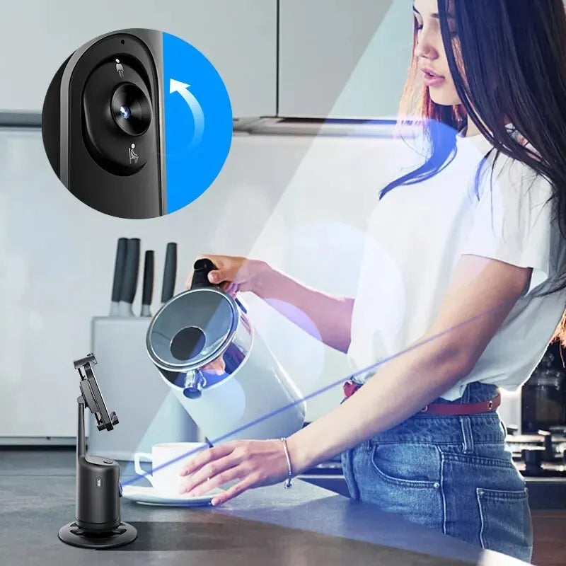 Face-tracking phone holder rotating with phone