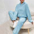Woman in fluffy teddy hoodie and trousers