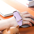 Pink bracelet hand warmer on wrist