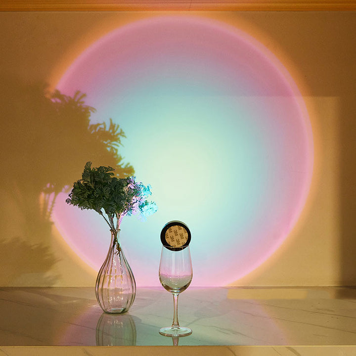 Round light casting sunset glow on wall