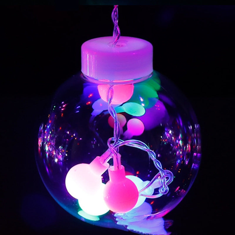 Warm white LED orb curtain lights in window