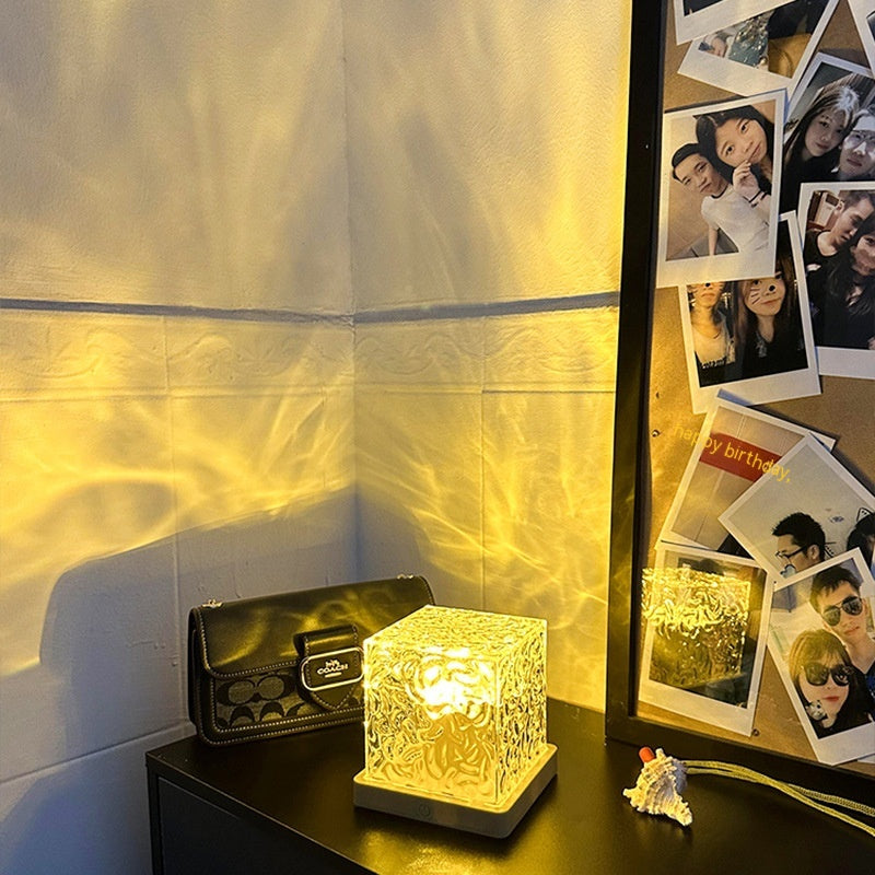 Water ripple night light on a wooden base