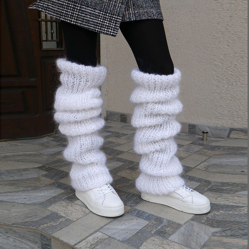 Chunky slouchy knitted leg warmers over boots