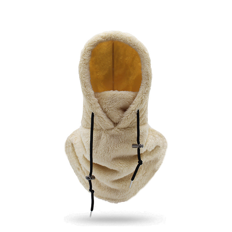 Woman wearing beige plush hood with scarf