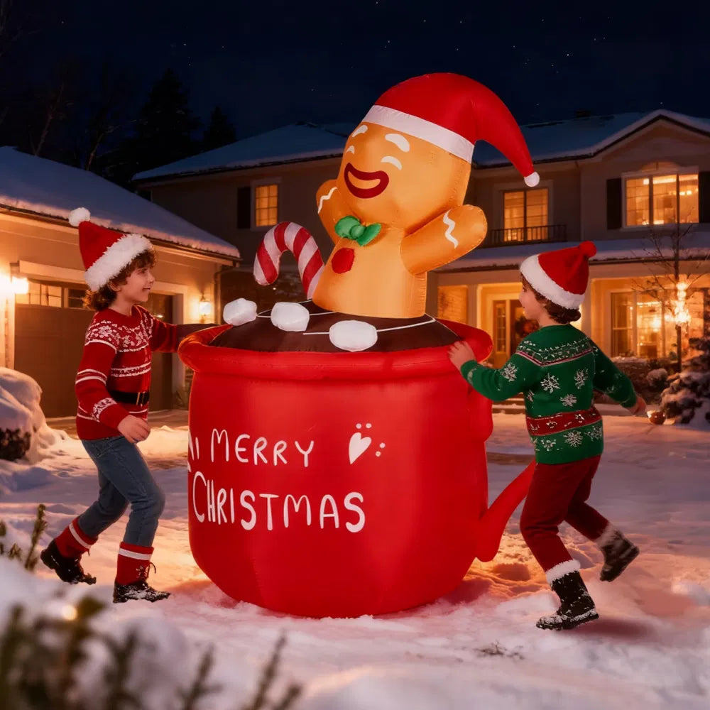 Inflatable gingerbread man in a cocoa mug