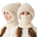 Woman wearing knitted hood with scarf