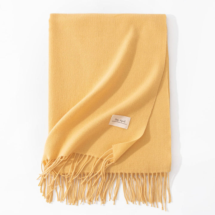Woman wearing wide soft shawl scarf