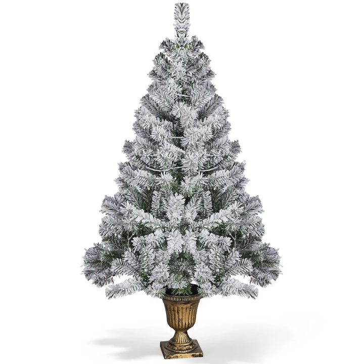 Small flocked tree in a decorative pot