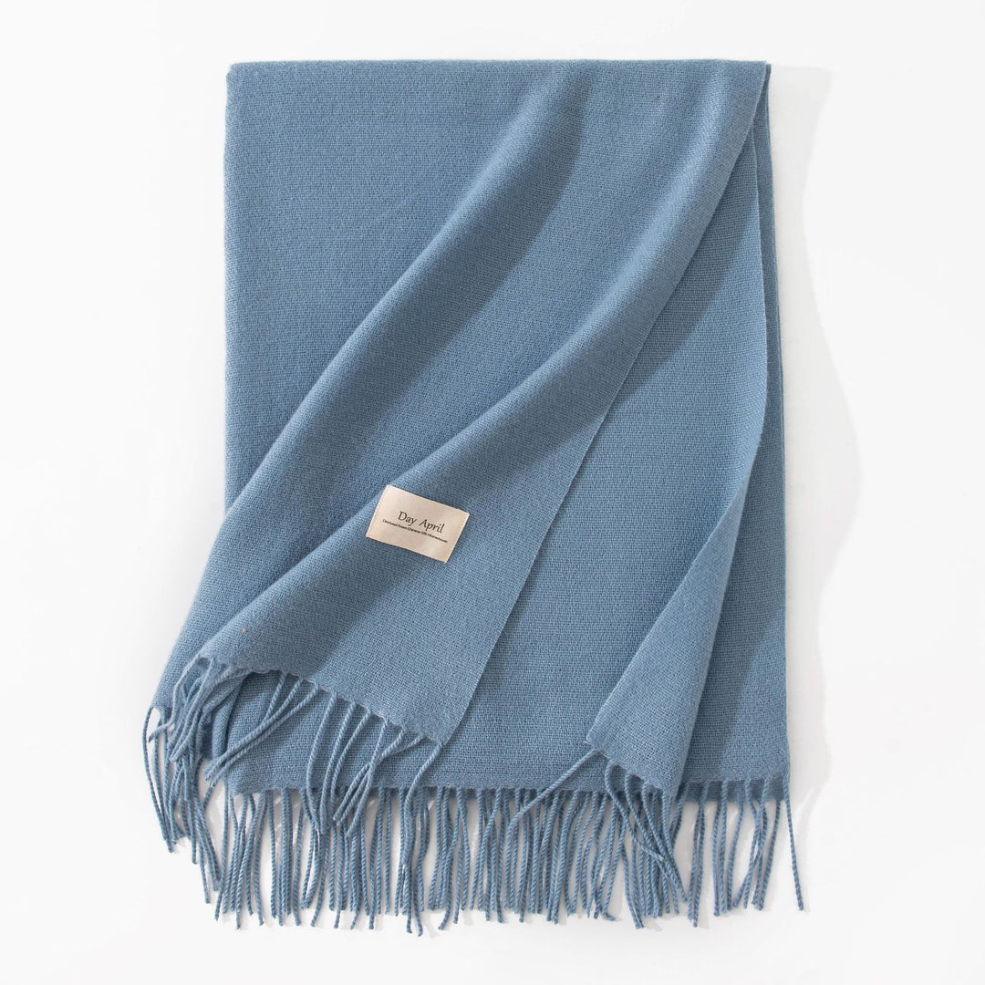 Woman wearing wide soft shawl scarf