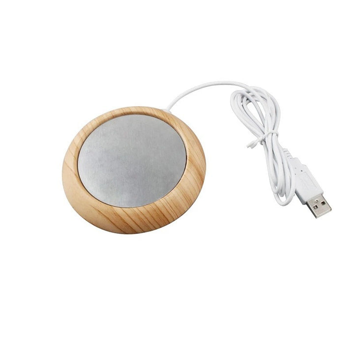 Wood-look USB coaster warming a coffee mug