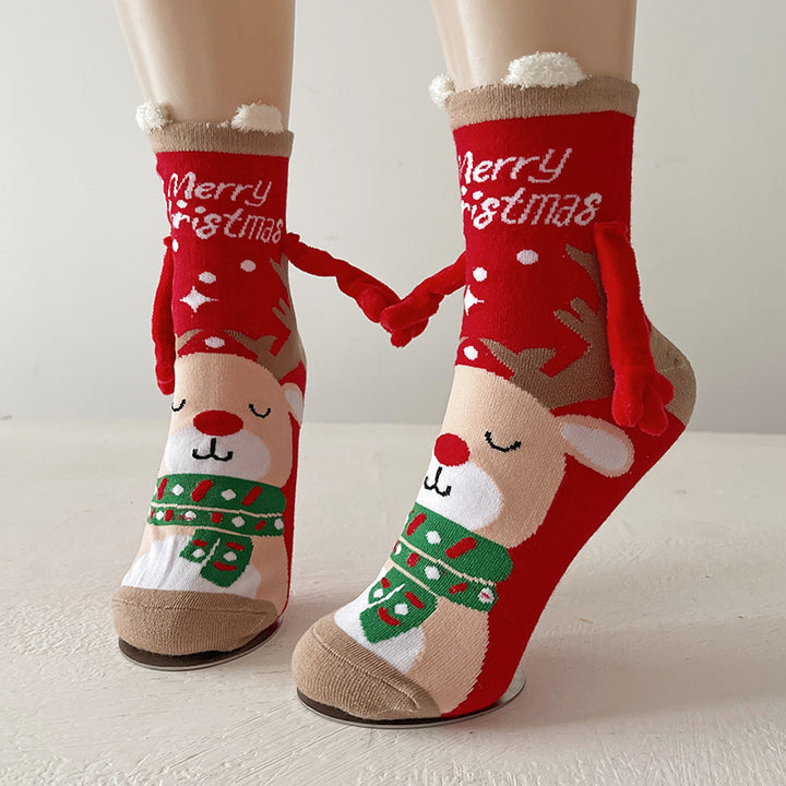 Christmas socks with magnetic hands linked