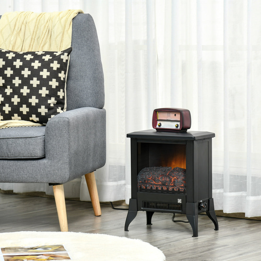 black electric stove heater with open glass front flames