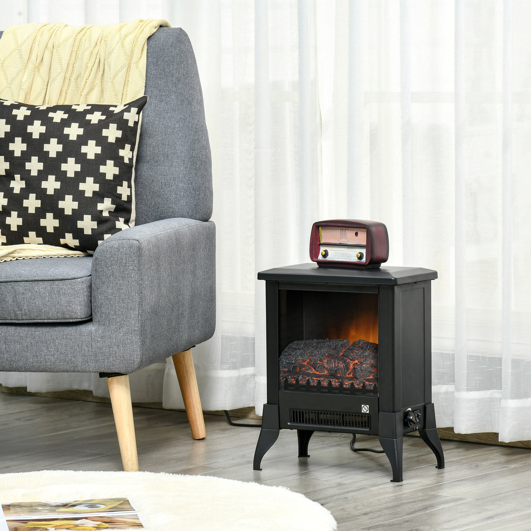 black electric stove heater with open glass front flames
