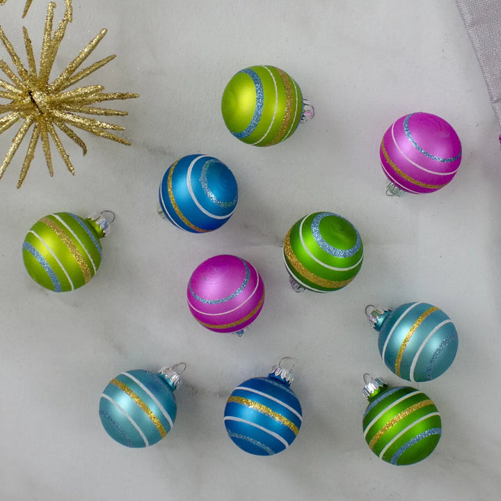 Ten matte glass baubles with glitter swirls