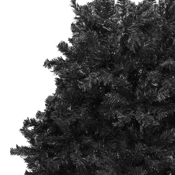 Full black spruce Christmas tree, unlit