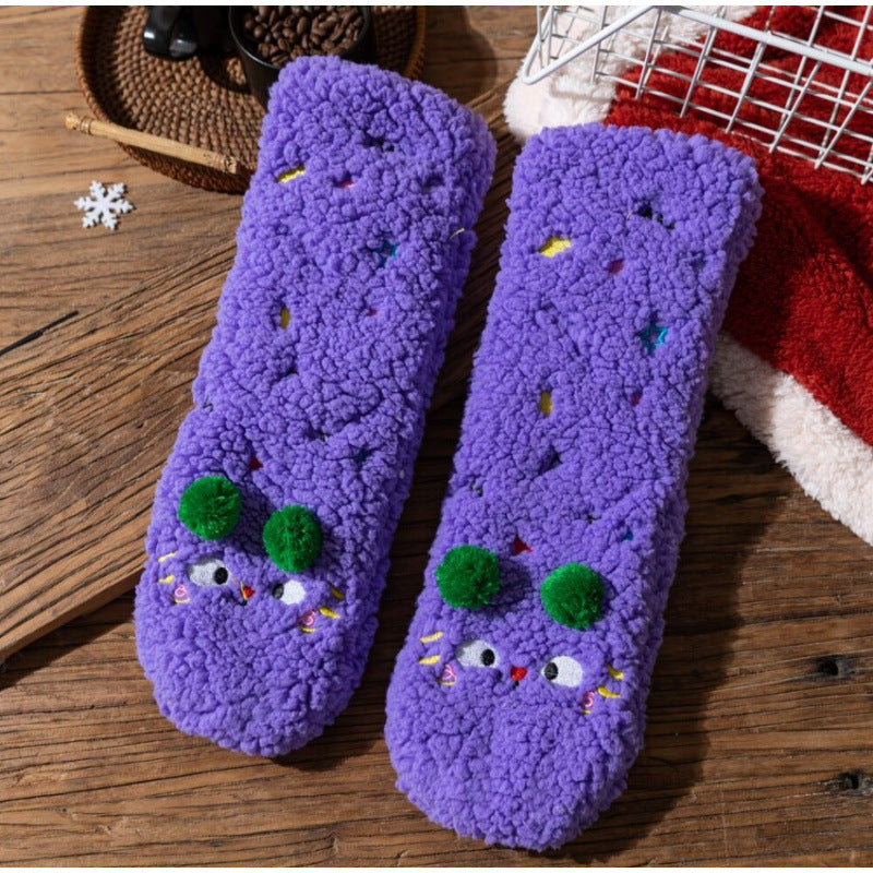Fluffy yellow socks with embroidered face and pompoms