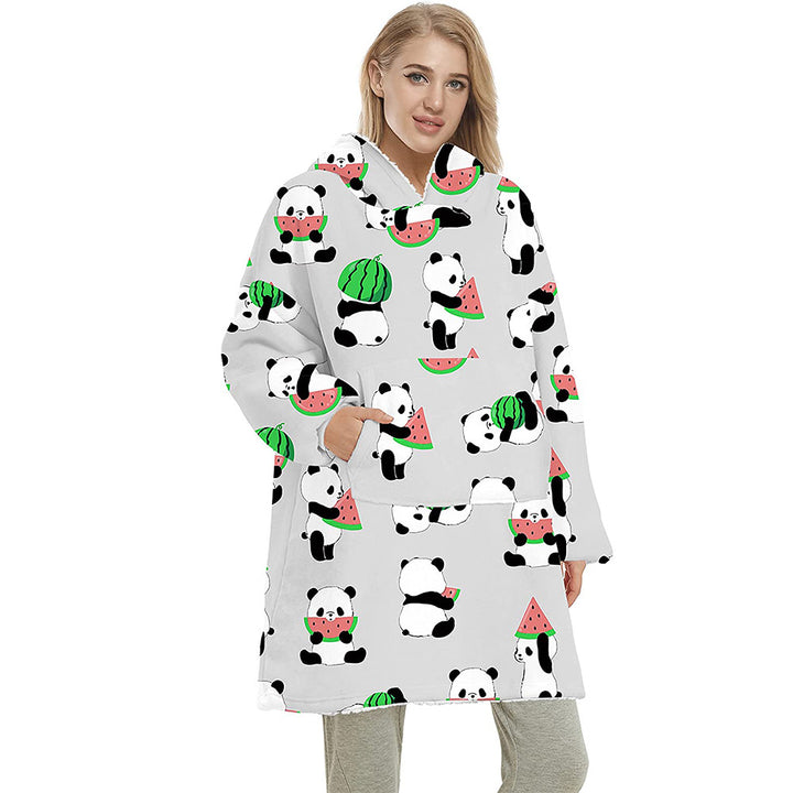 Person wearing oversized panda hooded blanket