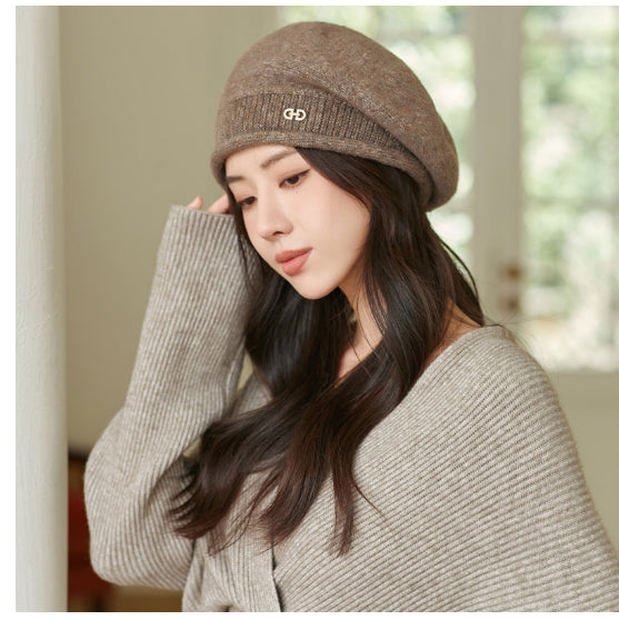 Off-white knitted beret with folded brim