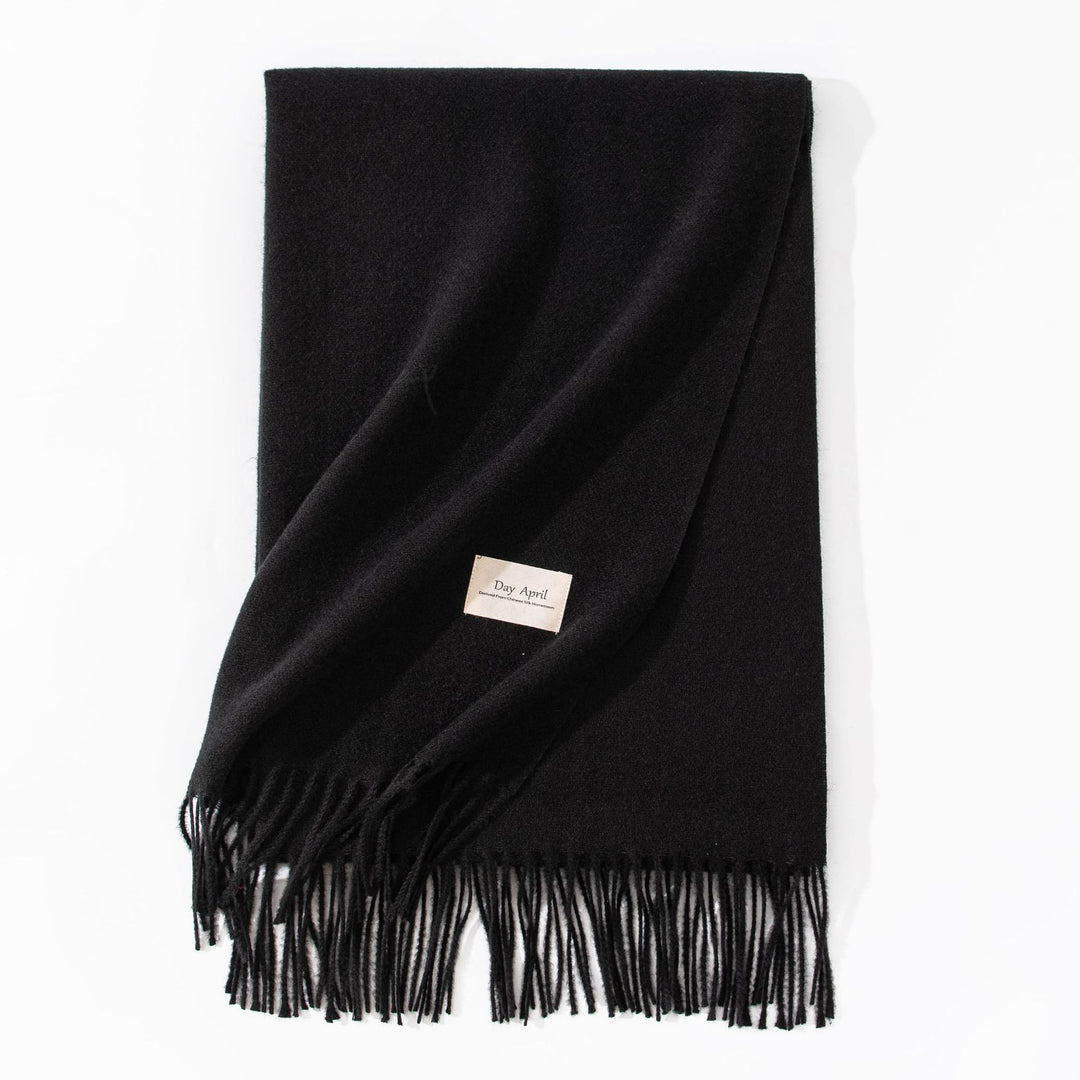 Woman wearing wide soft shawl scarf