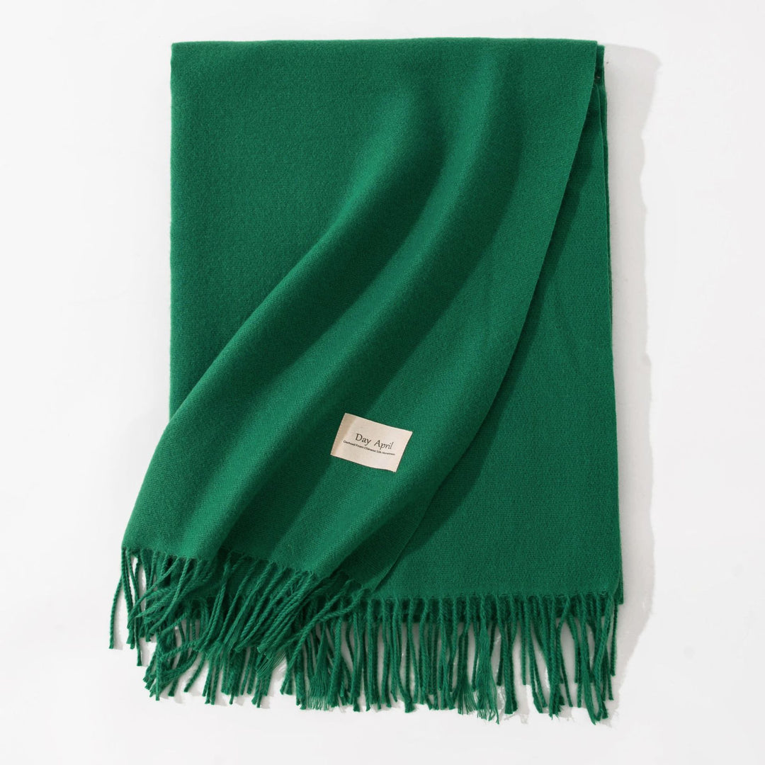 Woman wearing wide soft shawl scarf